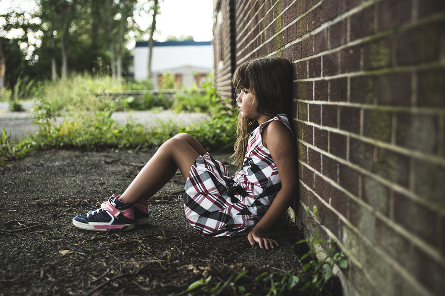 There aren t children in the schoolyard. Old School girl.